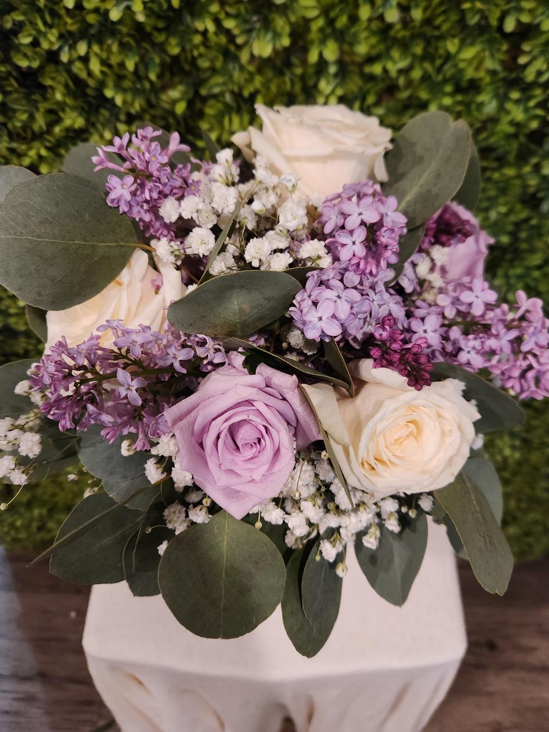 Mixed Flower Clutch With Roses Starting at $70.00